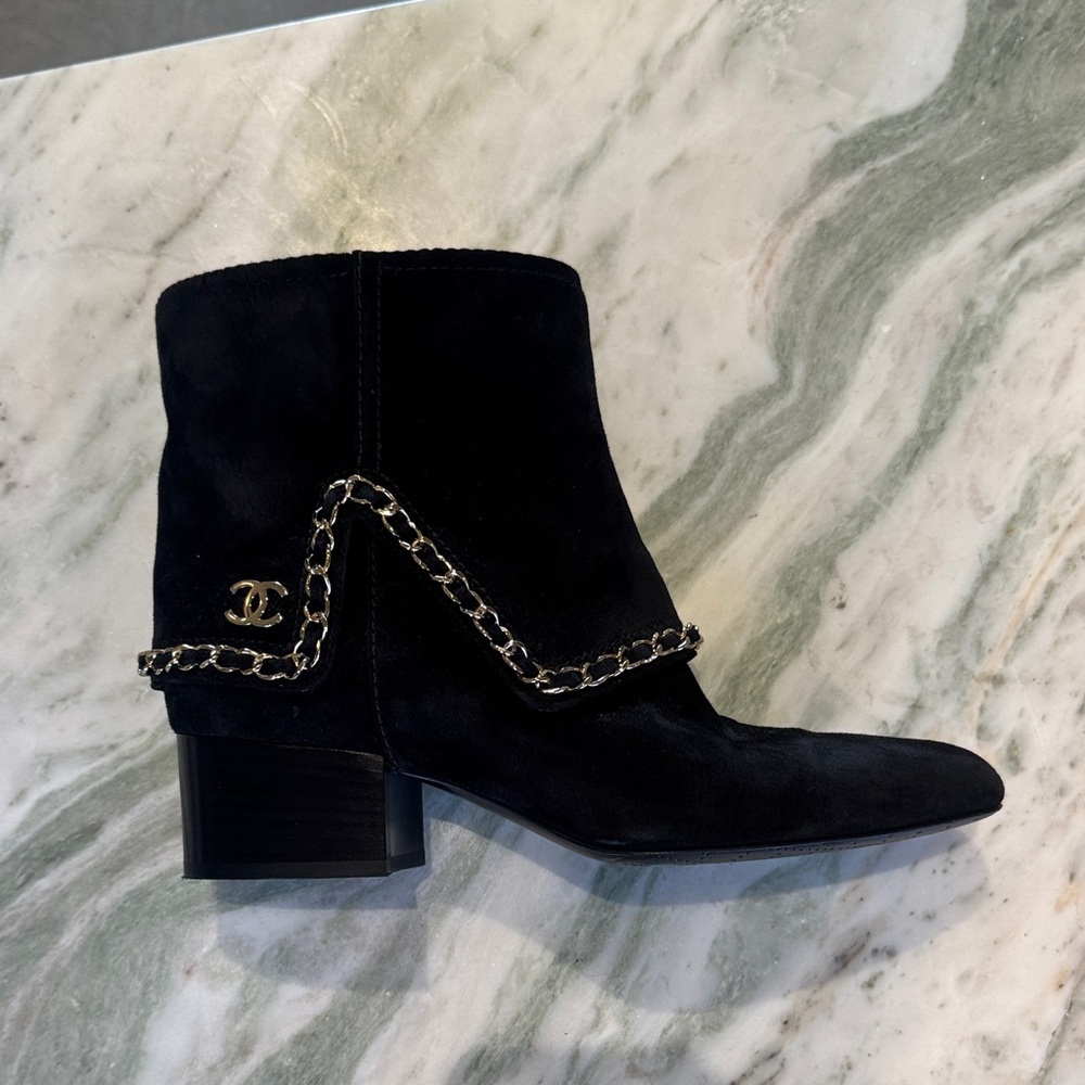 CHANEL Black Ankle Boots with Gold Chain Accent